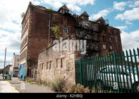 The run down Centre Street is on the opposite bank of the River Clyde from the prosperous city centre of Glasgow, Scotland Stock Photo