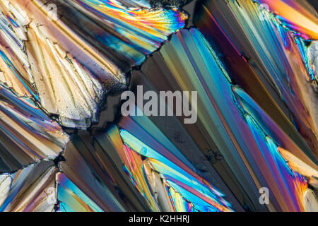 colorful microscopic shot of sugar micro crystals in polarized light Stock Photo