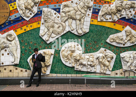 The Hachiko dog mural at the Shibuya train station in the Shibuya district of Tokyo, Japan, Asia. Stock Photo