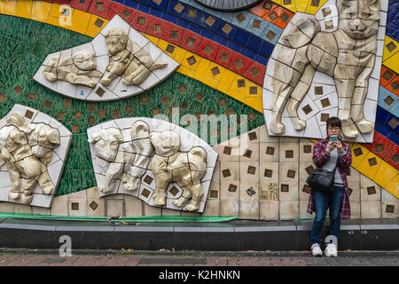 The Hachiko dog mural at the Shibuya train station in the Shibuya district of Tokyo, Japan, Asia. Stock Photo