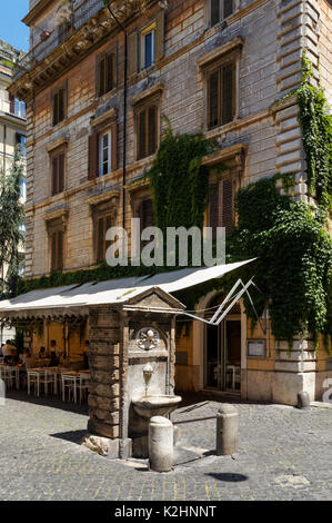 A nasone drinking fountain on Borgo Pio street in Rome, Italy Stock Photo