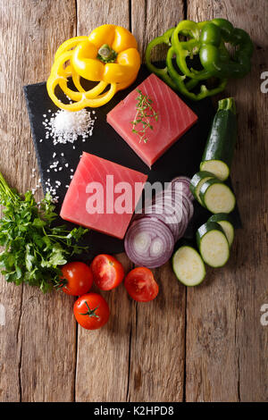 vegetables, spices and greens on cutting board isolated on white Stock ...