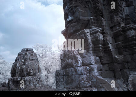 Angkor thom amazing realistic virtual face stone castle siem reap Cambodia Stock Photo