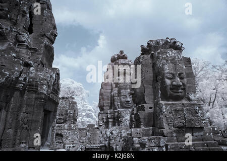 Angkor thom amazing realistic virtual face stone castle siem reap Cambodia Stock Photo