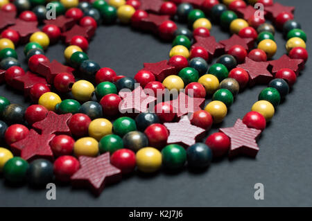 Colourful wooden craft beads pattern Stock Photo - Alamy