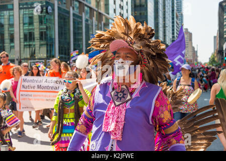 Montreal, Canada - 20 August 2017: First Nations people attend Montreal Gay Pride Parade Stock Photo