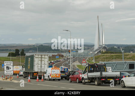 Queensferry, UK. 30th Aug, 2017. The Queensferry Crossing saw heavy traffic on it's first day of operation. At 1.6 miles long, it is the longest cable-stay bridge in the world, costing £1.35 billion. The bridge will be officially opened by the Queen on 4th of September, exactly 53 years after she opened the adjacent Forth road bridge, which the Queensferry Crossing replaces. Credit: Alan Paterson/Alamy Live News Stock Photo