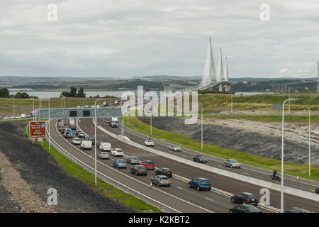 Queensferry, UK. 30th Aug, 2017. The Queensferry Crossing saw heavy traffic on it's first day of operation. At 1.6 miles long, it is the longest cable-stay bridge in the world, costing £1.35 billion. The bridge will be officially opened by the Queen on 4th of September, exactly 53 years after she opened the adjacent Forth road bridge, which the Queensferry Crossing replaces. Credit: Alan Paterson/Alamy Live News Stock Photo