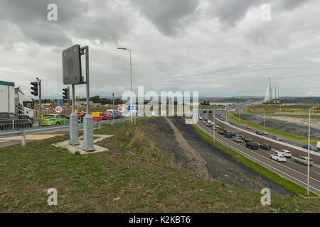 Queensferry, UK. 30th Aug, 2017. The Queensferry Crossing saw heavy traffic on it's first day of operation. At 1.6 miles long, it is the longest cable-stay bridge in the world, costing £1.35 billion. The bridge will be officially opened by the Queen on 4th of September, exactly 53 years after she opened the adjacent Forth road bridge, which the Queensferry Crossing replaces. Credit: Alan Paterson/Alamy Live News Stock Photo