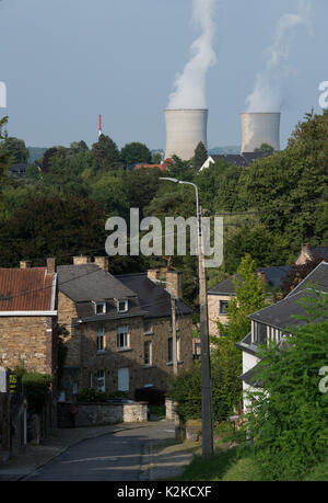 Tihange, Belgium. 28th Aug, 2017. Two cooling towers of the nuclear power plant issuing steam by the Mass river in Tihange, Belgium, 28 August 2017. The power plant is made up of 3 blocks with pressurized water reactors. Iodine tablets will be distributed for free in the Aachen region starting 01 September. The tablets are supposed to protect the population from thyroid cancer in the case of a reactor accident in the Belgian town of Tihange. Photo: Rainer Jensen/dpa/Alamy Live News Stock Photo