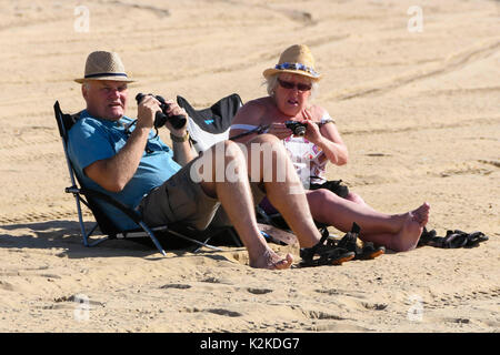 Bournemouth, Dorset, UK.  31st August 2017.  UK Weather.   Holidaymakers and visitors on the beach early lapping up the morning sunshine at the seaside resort of Bournemouth in Dorset on the first day of the air festival.  Photo Credit: Graham Hunt/17�Թ����� Live News Stock Photo