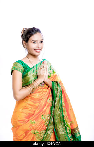 Happy young beautiful traditional Indian woman in traditional saree Stock Photo