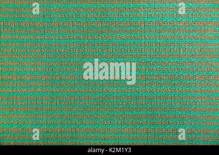 Wool fabric with bright green and brown geometric minimalistic pattern in the form of lines. Stock Photo