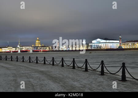 The view on the Strelka of Vasilyevsky island from rabbit island winter night in Saint Petersburg Stock Photo
