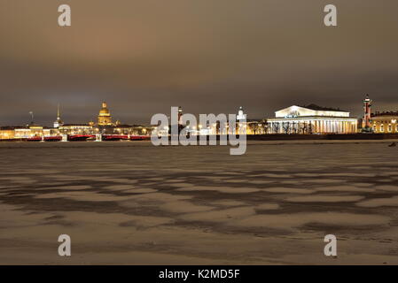 The view on the Strelka of Vasilyevsky island from the Peter and Paul fortress winter night in Saint Petersburg Stock Photo