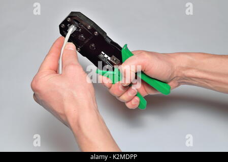 Crimped network cable mites Stock Photo