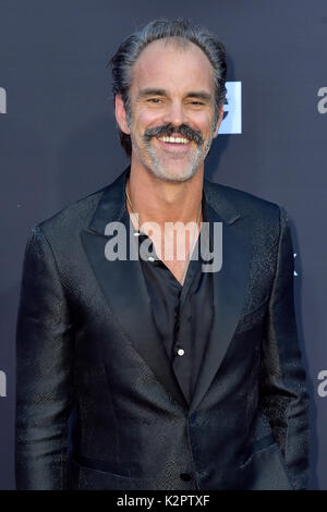 Los Angeles, USA. 22nd Oct, 2017. Steven Ogg attends AMC's 'The Walking Dead' Season 8 Premiere and the 100th Episode celebration at Greek Theatre on October 22, 2017 in Los Angeles, California. Credit: Geisler-Fotopress/Alamy Live News Stock Photo