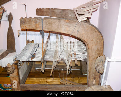 Ancient wooden loom. Ancient textile equipment Stock Photo