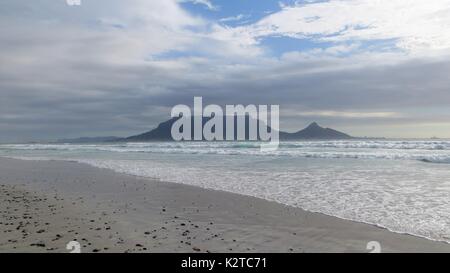 view of table mountain from bloubergstrand in cape town south africa