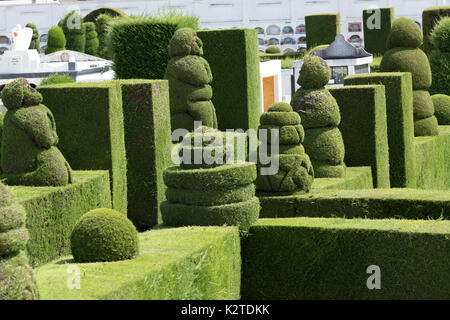 May 16, 2017 Tulcan, Ecuador: elaborate topiary in the high altuitude border town famous cemetery Stock Photo