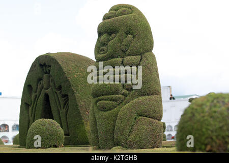 May 16, 2017 Tulcan, Ecuador: elaborate topiary in the high altuitude border town famous cemetery Stock Photo