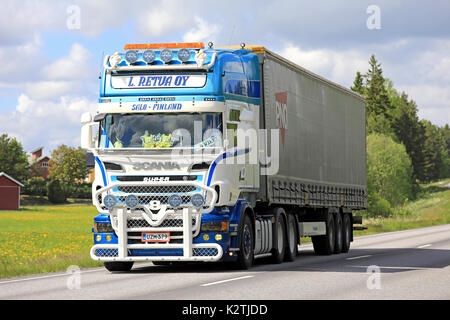 SALO, FINLAND - JUNE 11, 2017: Customized super Scania R500 Pokemon of L. Retva Oy semi trailer hauls goods along highway on a sunny day of summer. Stock Photo