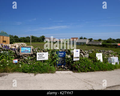 Tourist attraction signs displayed at Higher Town, St Martin's, Isles of Scilly. Stock Photo