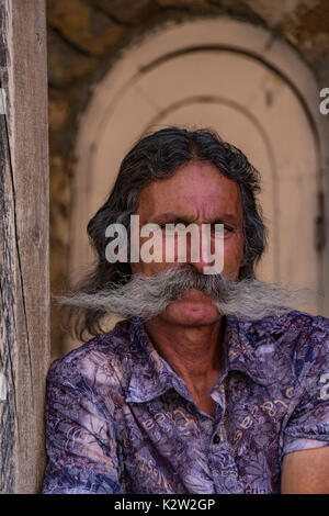 Man in Yerevan, Armenia has not trimmed his mustache for 40 years.  June 15, 2017 Stock Photo