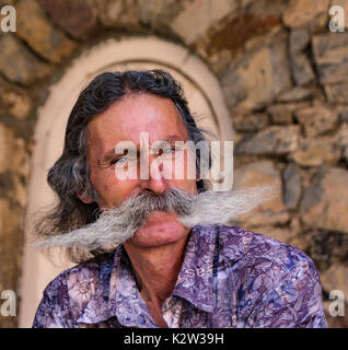 Man in Yerevan, Armenia has not trimmed his mustache for 40 years.  June 15, 2017 Stock Photo