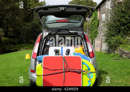 Car packed up and ready to leave rural Carmarthenshire on August summer holiday vacation to the Pembrokeshire Welsh Coast West Wales UK  KATHY DEWITT Stock Photo