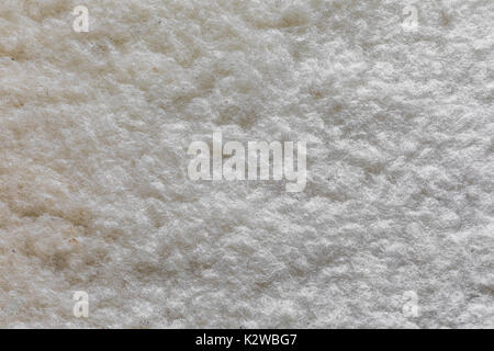 Woolen mat white texture with natural patterns can be used as background. Stock Photo
