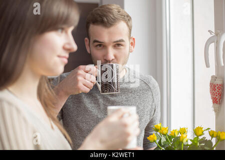 Attractive man and woman with coffee Stock Photo