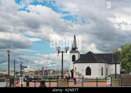 Cardiff, United Kingdom - August 09, 2017: Norwegian Church from the water. Tourists visit Cardiff Bay, Cardiff Stock Photo