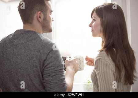 Young married people having coffee Stock Photo