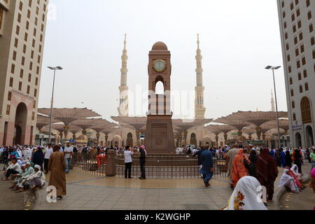 The Madina Clock Tower, also known as the Abraj Al-Bait Clock Tower, is a iconic landmark in Madinah, Saudi Arabia. Stock Photo