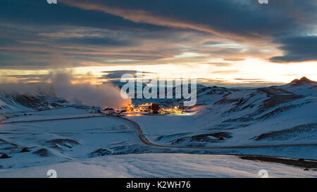 Krafla Geothermal power Plant Viewed From The Surrounding Snow Covered Hills During Twilight Stock Photo