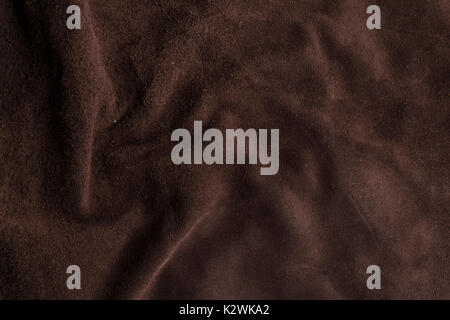 Waves of Italian brown chamois texture background. Stock Photo