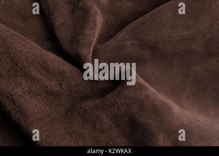 luxury Italian brown leathery chamois texture background. Stock Photo