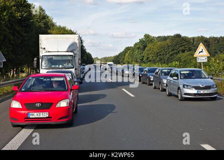 Cars on German motorway leaving a passage for emergency vehicles Stock Photo