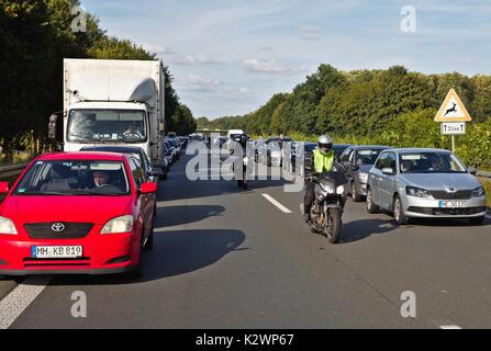 Cars on German motorway leaving a passage for emergency vehicles Stock Photo