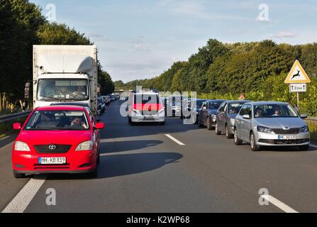 Cars on German motorway leaving a passage for emergency vehicles Stock Photo