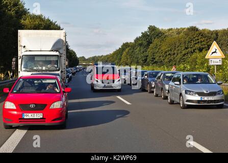 Cars on German motorway leaving a passage for emergency vehicles Stock Photo