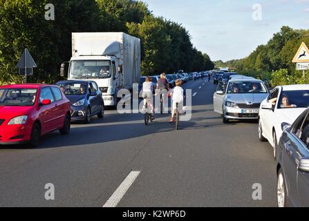 Cars on German motorway leaving a passage for emergency vehicles Stock Photo