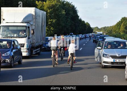 Cars on German motorway leaving a passage for emergency vehicles Stock Photo