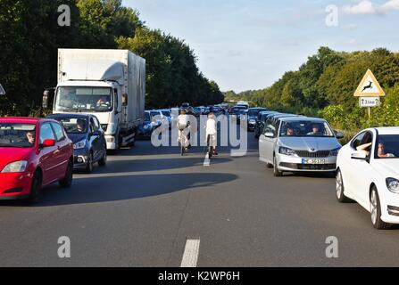 Cars on German motorway leaving a passage for emergency vehicles Stock Photo