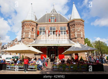 Holland, North, Amsterdam, Old city gate De Waag in the Nieuwmarkt neighbourhood, now a cafe. Stock Photo