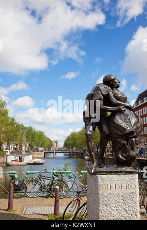 Holland, North, Amsterdam, Sculpture next to old city gate De Waag in the Nieuwmarkt neighbourhood. Stock Photo