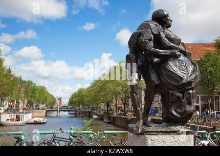 Holland, North, Amsterdam, Sculpture next to old city gate De Waag in the Nieuwmarkt neighbourhood. Stock Photo