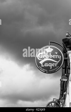 Carlsberg Guinness Beer sign outside a Pub in Clare, Ireland Stock Photo