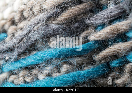 highly detailed needlework wool fabric, close up wool texture background. Stock Photo